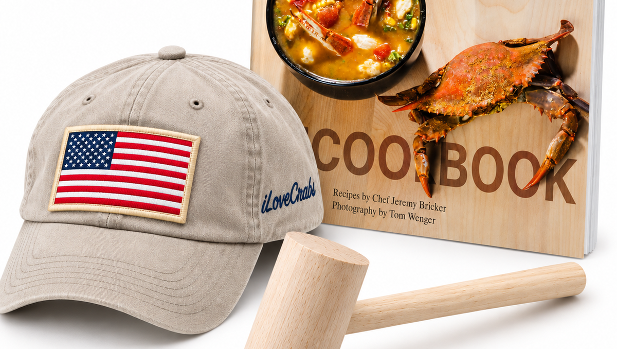 Beige iLoveCrabs cap with an American flag patch, close-up