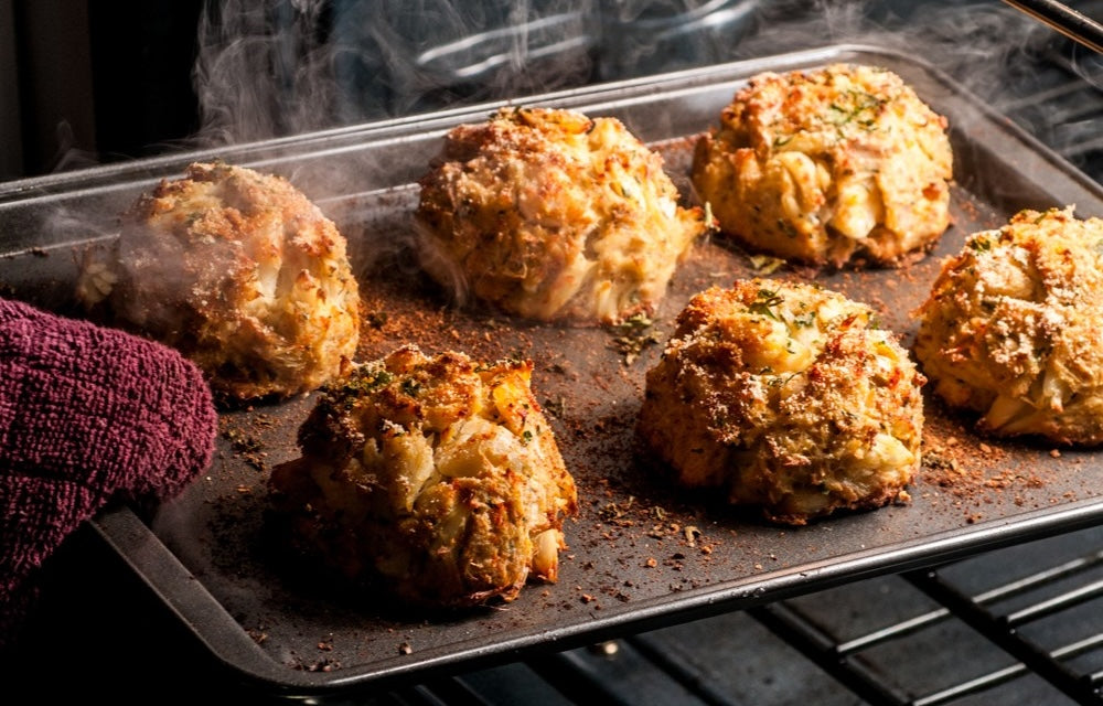 Tray of six jumbo lump crab cakes fresh from the oven