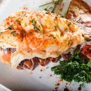 Broiled Maine lobster tail, meat piggybacked on the shell