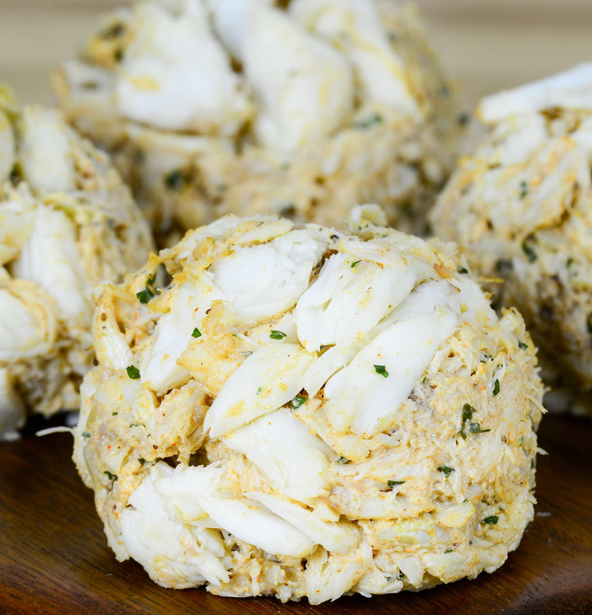 Jumbo lump crab cake close-up showing large chunks of crab meat