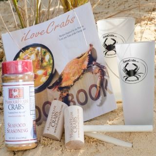 Crab lovers gift set displayed on sand with the iLoveCrabs Cookbook