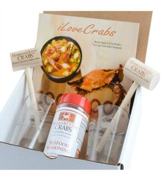 Crab lovers gift box with cookbook, seasoning and glasses, angled view