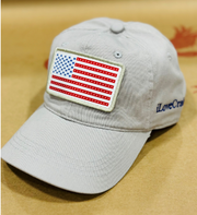 Gray iLoveCrabs USA cloth cap with an American flag patch, front